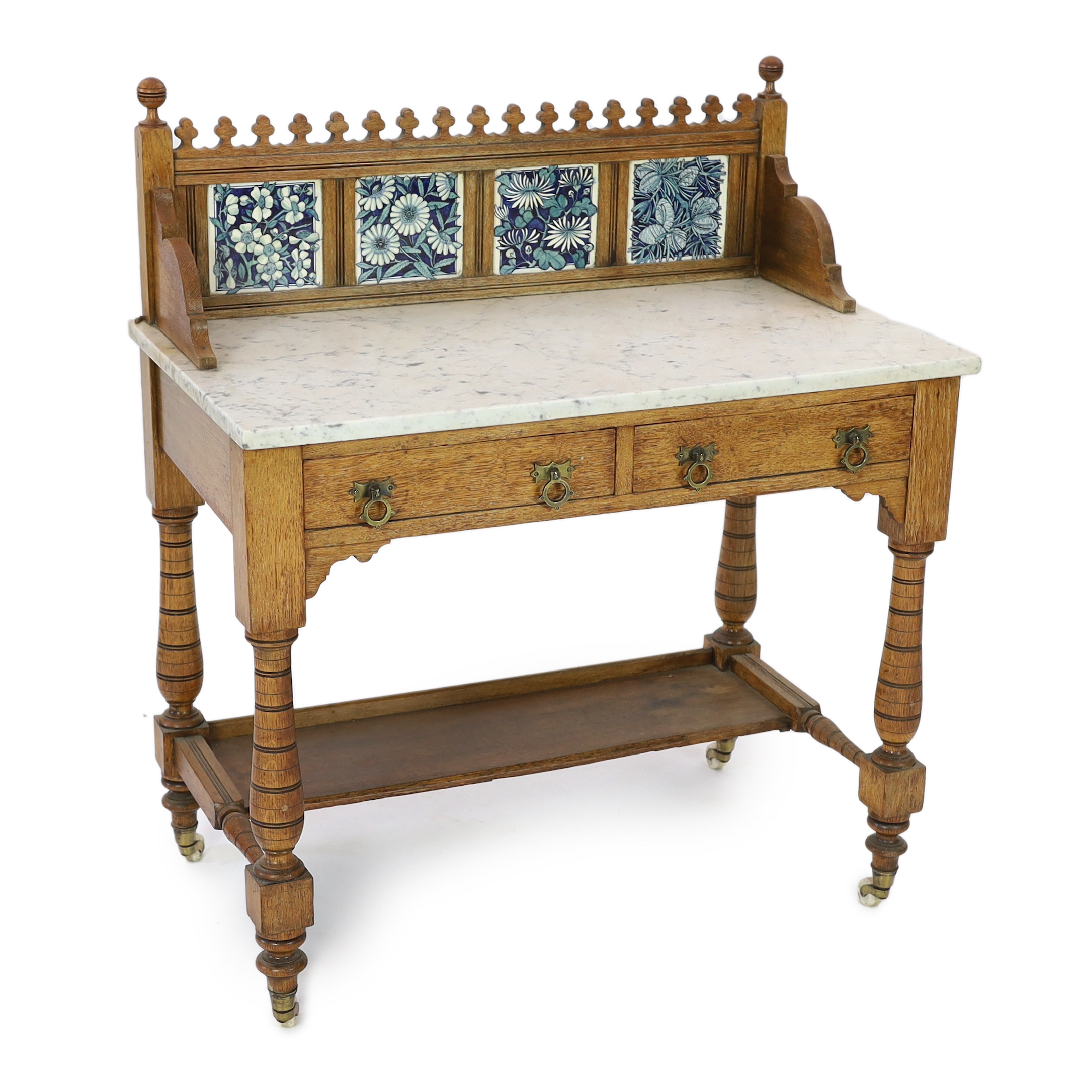 Lewis Foreman Day (1845-1910). A Victorian Aesthetic movement golden oak and marble washstand, width 90cm, depth 51.5cm, height 104cm